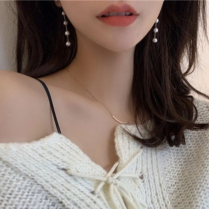 new-trend-simulated-pearl-white-round-pearl-earrings-9791