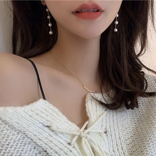 new-trend-simulated-pearl-white-round-pearl-earrings-9791